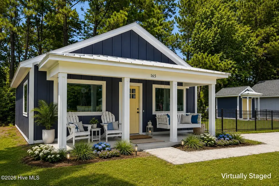 165 Long Pond Loop, Swansboro, NC 28584 — 2-bedroom waterfront condo in Cabins at Old Horse, Swansboro, NC, photo 1 of 25: Exterior Front Virtually Staged