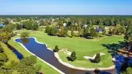 8751 Nashville Drive NW Lot 1215- St. Phillips, Calabash, NC 28467 — 3-bedroom home in Brunswick Plantation, Calabash, NC, photo 10 of 11: CRS_Brunswick_Plantation_Aerial_Masthead
