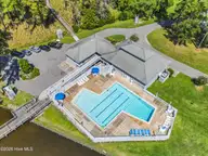 111 Forecastle Court, Washington, NC 27889 — 3-bedroom waterfront townhome in Pamlico Plantation, Washington, NC, photo 23 of 34: Aerial of Pool at Pamlico Plantation