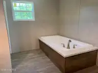 316 Commodore Drive, Rocky Mount, NC 27801 — 3-bedroom manufactured home in Eastfield, Rocky Mount, NC, photo 17 of 32: Master Bath Large Soaking Tub