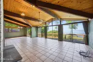 1 Nicklaus Drive, New Bern, NC 28560 — 3-bedroom waterfront home in Carolina Pines, New Bern, NC, photo 8 of 68: Living Dining Areas