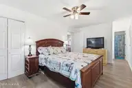 4580 Squirrel Avenue NW, Shallotte, NC 28470 — 3-bedroom home in Wildwood Village, Shallotte, NC, photo 20 of 30: Mater. Bedroom aat end of Hall