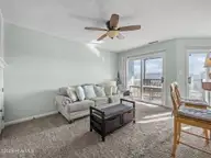 8713 Plantation Drive 402, Emerald Isle, NC 28594 — 3-bedroom waterfront townhome in Emerald Plantation, Emerald Isle, NC, photo 18 of 68: Den