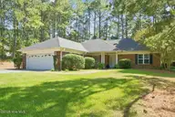 2 Winding Trail, Whispering Pines, NC 28327 — 3-bedroom home in Whispering Winds, Whispering Pines, NC, photo 1 of 45: FRONT