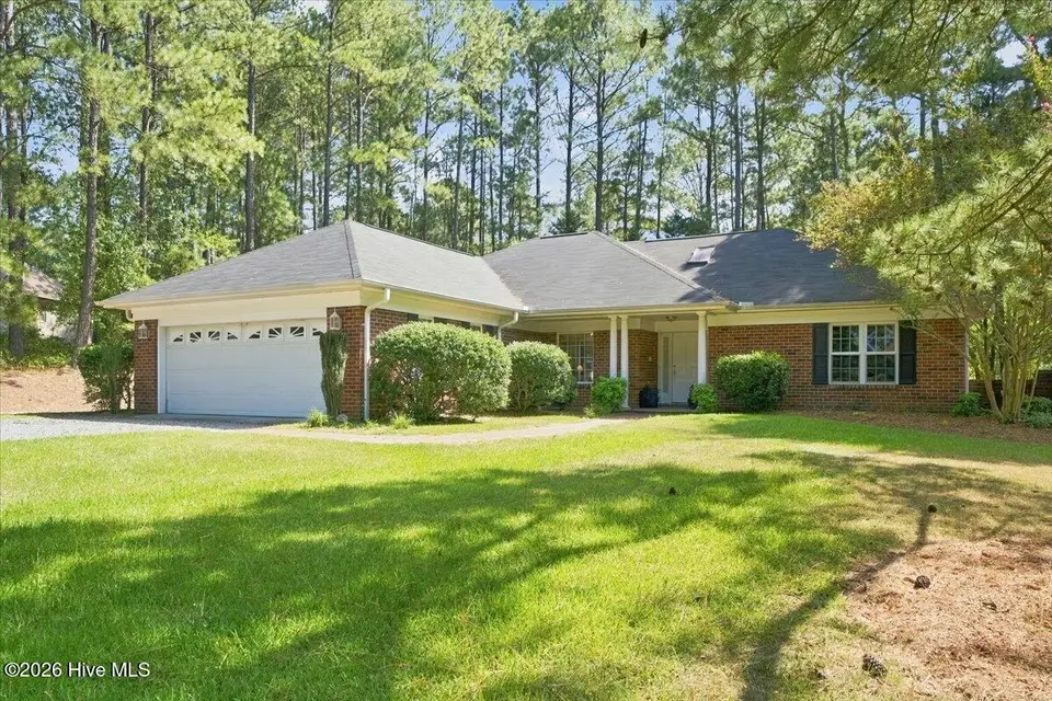 2 Winding Trail, Whispering Pines, NC 28327 — 3-bedroom home in Whispering Winds, Whispering Pines, NC, photo 1 of 45: FRONT