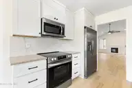 4930 N Hampton Drive SE, Southport, NC 28461 — 3-bedroom waterfront home in Carolina Place, Southport, NC, photo 11 of 58: Kitchen