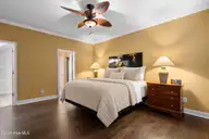222 Pilothouse Place, Carolina Shores, NC 28467 — 3-bedroom condo in Beacon Townes, Carolina Shores, NC, photo 22 of 46: Owners Suite