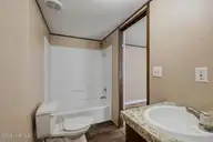 1426 Cherrytree Road NE, Winnabow, NC 28479 — 2-bedroom manufactured home in Deerfield Estates, Winnabow, NC, photo 18 of 25