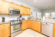 1131 S Shore Drive, Surf City, NC 28445 — 4-bedroom waterfront home in Horse Hammock, Surf City, NC, photo 4 of 40: Kitchen II