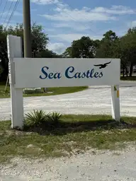2286 Barnacle Drive SW, Supply, NC 28462 — 1-bedroom home in Sea Castles, Supply, NC, photo 2 of 56: Barnacle Sea Castle sign