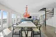 7313 Ocean Drive, Emerald Isle, NC 28594 — 5-bedroom waterfront home in Oakland Hills, Emerald Isle, NC, photo 10 of 66: Dining Area to Living Area