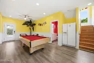 100 9th Street, Emerald Isle, NC 28594 — 6-bedroom waterfront home in Emerald Isle By The Sea, Emerald Isle, NC, photo 15 of 64: Pool Room