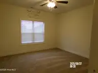 263 Wood House Drive, Jacksonville, NC 28546 — 3-bedroom home in Stateside, Jacksonville, NC, photo 11 of 15: Front Bedroom