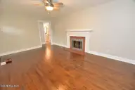853 Burton Street, Rocky Mount, NC 27803 — 3-bedroom home in Cedarbrook, Rocky Mount, NC, photo 10 of 15: Living rooom 2