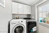 1072 Salter Path Road, Salter Path, NC 28512 — 3-bedroom waterfront manufactured home, Salter Path, NC, photo 21 of 50: Laundry Room