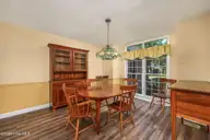 514 Woods Court SW, Sunset Beach, NC 28468 — 3-bedroom home in Sea Trail Plantation, Sunset Beach, NC, photo 22 of 50: 50-web-or-mls-41 dining room