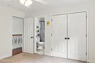 315 Chestnut Drive, Vass, NC 28394 — 4-bedroom home in Woodlake, Vass, NC, photo 19 of 27: Upstairs Bedroom