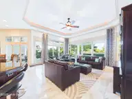 8900 Mahogany Run, Wilmington, NC 28411 — 3-bedroom home in Porters Neck Plantation, Wilmington, NC, photo 22 of 75: 36-web-or-mls-37_STILL083_great-room