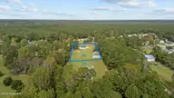 282 Mill Creek Road, Newport, NC 28570 — lot, Newport, NC, photo 1 of 10: Property with garage/workshop