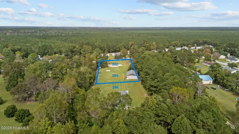 282 Mill Creek Road, Newport, NC 28570 — lot, Newport, NC, photo 1 of 10: Property with garage/workshop
