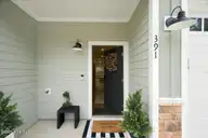 391 James Street, Vass, NC 28394 — 3-bedroom townhome in James Pointe Townhomes, Vass, NC, photo 9 of 51: Charming front porch