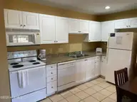 490 Little River Farm Boulevard A104, Carthage, NC 28327 — 2-bedroom condo in Little River Fa, Carthage, NC, photo 3 of 17: A104 Kitchen