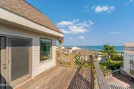 301 Salter Path Road 12 Genesis, Pine Knoll Shores, NC 28512 — 3-bedroom waterfront condo in Genesis, Pine Knoll Shores, NC, photo 24 of 48: Spacious Deck with Ocean Views