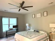 669 Pelican Circle, Bolivia, NC 28422 — 3-bedroom waterfront home in River Run Plantation, Bolivia, NC, photo 9 of 25: Primary Bedroom