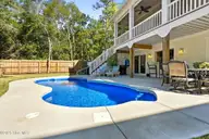 111 SW 22nd Street, Oak Island, NC 28465 — 4-bedroom home in Pinners Point, Oak Island, NC, photo 8 of 73: pool