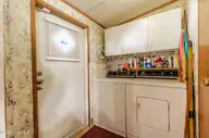 2874 Bird Drive SW 208, Shallotte, NC 28470 — 3-bedroom manufactured home in Shell Point, Shallotte, NC, photo 23 of 60: Laundry Area