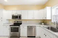 613 Elfin Court, Leland, NC 28479 — 2-bedroom townhome in Westport, Leland, NC, photo 13 of 28: Kitchen