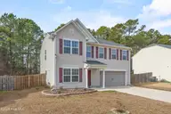 215 Chalet Road, Holly Ridge, NC 28445 — 4-bedroom home in The Reserve @ Holly Ridge, Holly Ridge, NC, photo 2 of 45: 2_front exterior