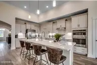 511 Heart Pine Avenue, Wilmington, NC 28411 — 3-bedroom home in Indigo at Abbey Preserve, Wilmington, NC, photo 7 of 27: Kitchen