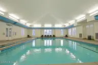 2858 Belmont Lake Drive, Rocky Mount, NC 27804 — lot in Belmont Lake Preserve, Rocky Mount, NC, photo 15 of 28: Indoor heated salt pool
