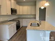3150 Firefly Trail, Grimesland, NC 27837 — 4-bedroom home in Summer Place, Grimesland, NC, photo 11 of 27: SP 061 2604 Kitchen 3