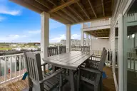 200 Olde Towne Yacht Club Drive 54, Beaufort, NC 28516 — 3-bedroom waterfront townhome in Inlet Cove Townhomes, Beaufort, NC, photo 11 of 55: Living Room Deck