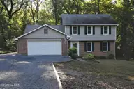 110 Stornoway Drive, Southern Pines, NC 28387 — 3-bedroom home in Highland Trails, Southern Pines, NC, photo 1 of 4: Front