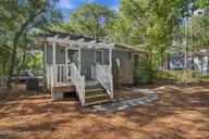 114 NW 23rd Street, Oak Island, NC 28465 — 2-bedroom waterfront home in Pinners Point, Oak Island, NC, photo 3 of 32: 28-web-or-mls-DSC09411