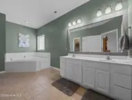 200 E Howard Drive, Jacksonville, NC 28540 — 4-bedroom home in River Bluff, Jacksonville, NC, photo 22 of 55: Primary suite bathroom 1