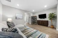 5017 Northstar Drive, Leland, NC 28451 — 3-bedroom townhome in Bishops Ridge, Leland, NC, photo 12 of 51: 13_living room