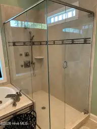 4611 Lapis Court, New Bern, NC 28562 — 3-bedroom home in Carolina Colours, New Bern, NC, photo 14 of 26: Primary Bathroom Shower
