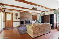2604 One Iron Street, Morehead City, NC 28557 — 4-bedroom home in Country Club East, Morehead City, NC, photo 6 of 40: Family room