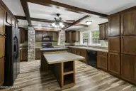 552 Colonial Landing Road SE, Bolivia, NC 28422 — 2-bedroom waterfront manufactured home in Vineyard Landing, Bolivia, NC, photo 14 of 52: 14-web-or-mls-Kitchen