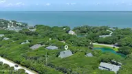 573 Coral Ridge Road, Pine Knoll Shores, NC 28512 — 4-bedroom waterfront home in Beacon's Reach, Pine Knoll Shores, NC, photo 3 of 59: Stunning Pine Knoll Shores home
