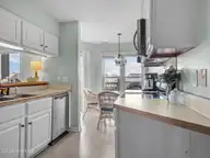 8713 Plantation Drive 402, Emerald Isle, NC 28594 — 3-bedroom waterfront townhome in Emerald Plantation, Emerald Isle, NC, photo 15 of 68: Kitchen 7