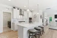 24 W Abaco Way, Hampstead, NC 28443 — 4-bedroom home in Sanctuary at Forest Sound, Hampstead, NC, photo 12 of 63: Kitchen