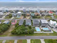 210 W Beach Drive, Oak Island, NC 28465 — 4-bedroom waterfront home, Oak Island, NC, photo 4 of 42: 4-web-or-mls-DJI_20250614135902_0269_D