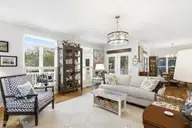 503 W Yacht Drive, Oak Island, NC 28465 — 4-bedroom home in Tranquil Harbor, Oak Island, NC, photo 7 of 53: Living Room 2