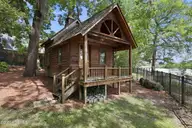 268 Shoreline Drive, New Bern, NC 28562 — 4-bedroom waterfront home in River Bend, New Bern, NC, photo 11 of 69: back side of flex space