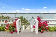 8722 Emerald Plantation Road, Emerald Isle, NC 28594 — 4-bedroom waterfront home in Emerald Plantation, Emerald Isle, NC, photo 5 of 63: 8722 EP Deck View Virtually Staged